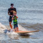 Carson Green, 6, of Berlin, was one of the lucky individuals who got to go surfing this week. Photo by Chris Parypa