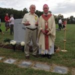 Joe Mulholland, who came up with the idea, is pictured with Bishop Francis Malooly last Sunday.