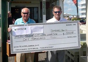 Shockley, Owner Of Shenanigan’s, Presents Check To OC Lions Club