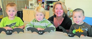 Early Intervention Teacher Deb Quilter Helps Students Make Bat Pumpkins