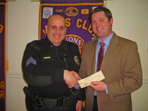 King Lion Presents Check For $400 To OC Police Sgt.