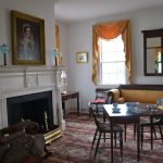 An interior room of the Taylor House Museum features a portrait of Mary White, who built the house. Photo by Charlene Sharpe