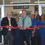 Stephen Decatur High School administrators and Board of Education officials join cafeteria staff in cutting the ribbon on the new café Tuesday. 